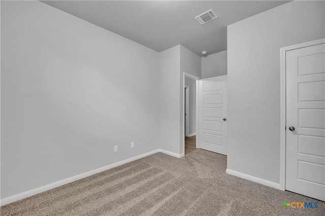 unfurnished bedroom with light carpet