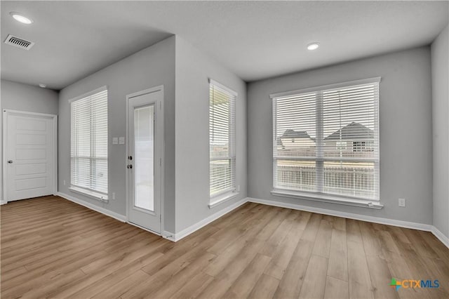 entrance foyer featuring light wood-type flooring