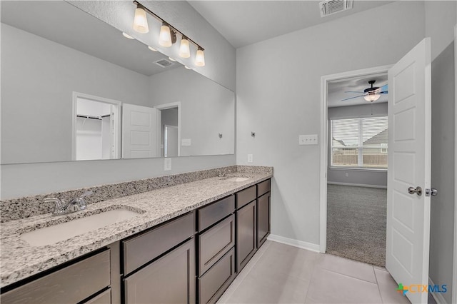 bathroom with vanity, tile patterned floors, and ceiling fan