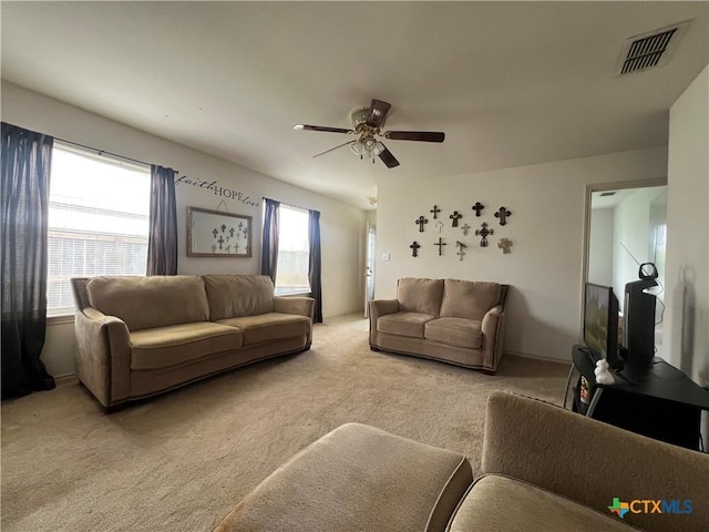 316 Clydesdale Ln, Victoria, TX 77904 - living area featuring light colored carpet and a ceiling fan