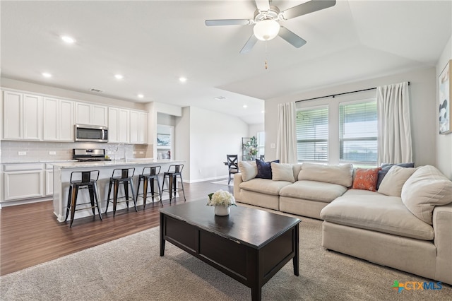 300 Golden Plains Pkwy, Hutto, TX 78634 - living room with recessed lighting, ceiling fan, and dark wood-type flooring
