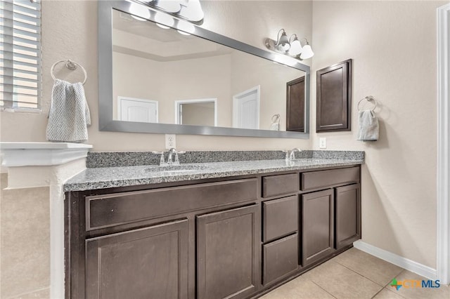 bathroom featuring vanity and tile patterned floors