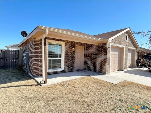 ranch-style home with a garage