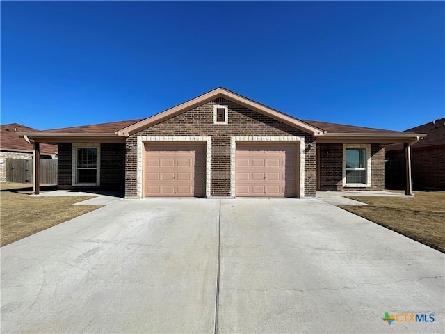 ranch-style home with a garage