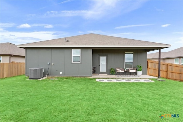 8409 Glade Dr, Temple, TX 76502 - rear view of property with a fenced backyard, a patio, and board and batten siding