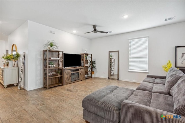 8409 Glade Dr, Temple, TX 76502 - living room featuring a ceiling fan, wood finished floors, and recessed lighting