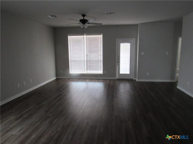10018 Kensley Rose Dr, Killeen, TX 76542 - spare room featuring ceiling fan and dark wood-style flooring