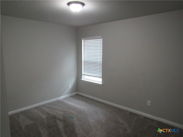 10018 Kensley Rose Dr, Killeen, TX 76542 - carpeted empty room with baseboards