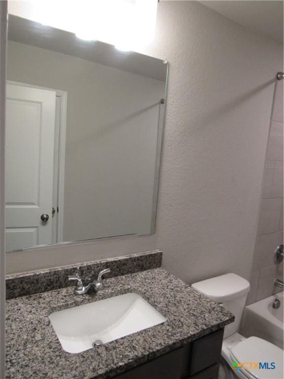 10018 Kensley Rose Dr, Killeen, TX 76542 - bathroom featuring vanity, shower / tub combination, and a textured wall