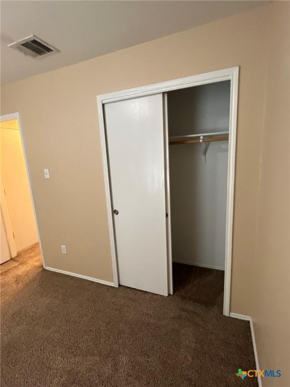 9109 Bellgrove Ct, Killeen, TX 76542 - unfurnished bedroom with a closet, carpet flooring, visible vents, and baseboards
