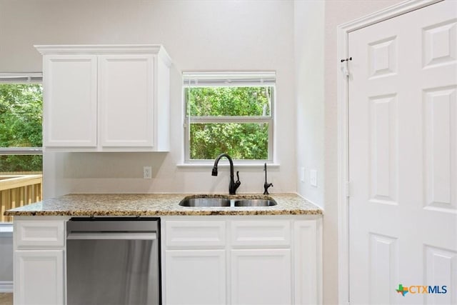 215 Sheridan Loop, Belton, TX 76513 - kitchen with dishwasher, white cabinets, and light stone counters