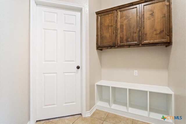 215 Sheridan Loop, Belton, TX 76513 - mudroom featuring light tile patterned floors and baseboards