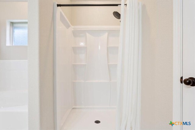 215 Sheridan Loop, Belton, TX 76513 - full bathroom featuring a shower stall and a bath