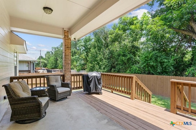 215 Sheridan Loop, Belton, TX 76513 - wooden deck featuring a fenced backyard and grilling area