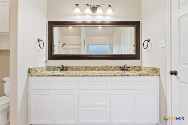 215 Sheridan Loop, Belton, TX 76513 - bathroom featuring toilet and double vanity