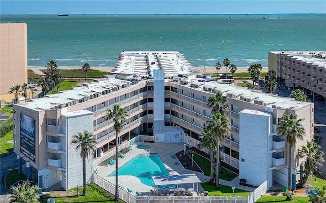 3938 Surfside Blvd Unit 3116, Corpus Christi, TX 78402 - aerial view of a nearby body of water, a pool, and apartment complex