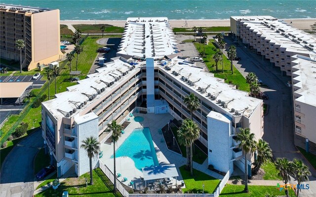 3938 Surfside Blvd Unit 3116, Corpus Christi, TX 78402 - bird's eye view of a pool and waterfront with a beach