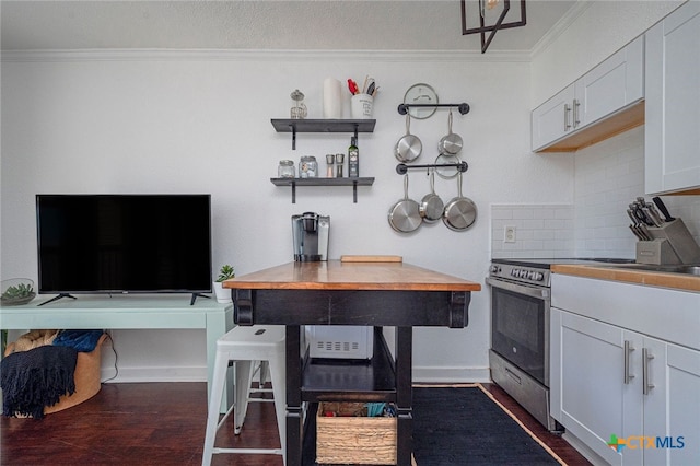 3938 Surfside Blvd Unit 3116, Corpus Christi, TX 78402 - kitchen featuring crown molding, backsplash, stainless steel range with electric cooktop, dark wood-style flooring, and white cabinets
