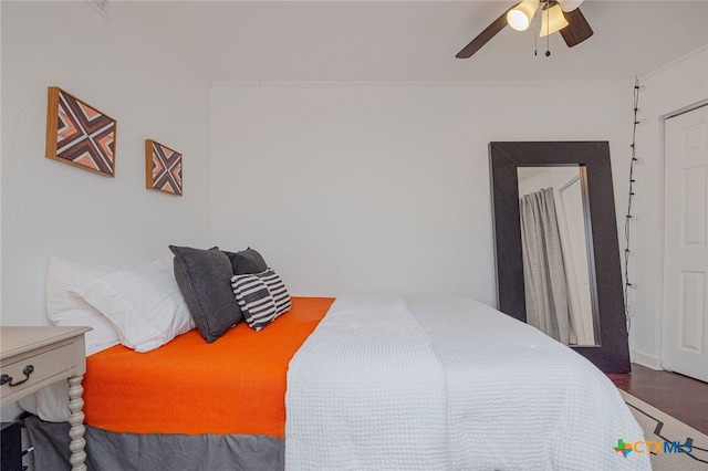 3938 Surfside Blvd Unit 3116, Corpus Christi, TX 78402 - bedroom featuring wood finished floors and ceiling fan