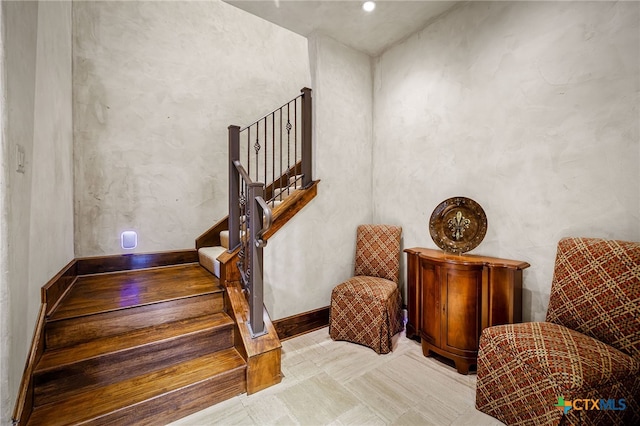 stairway with baseboards