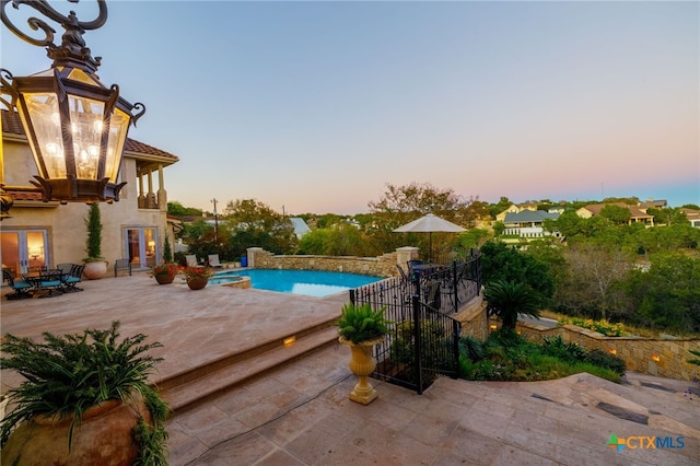 pool featuring a patio