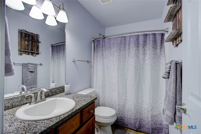 126 Breezy St, Rockport, TX 78382 - bathroom with vanity and a shower with shower curtain