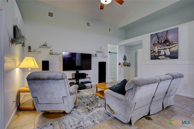 126 Breezy St, Rockport, TX 78382 - living area featuring a ceiling fan and wainscoting