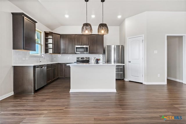 1910 Ashburn Dr, Temple, TX 76502 - kitchen with appliances with stainless steel finishes, dark brown cabinetry, open shelves, dark wood-style floors, and lofted ceiling