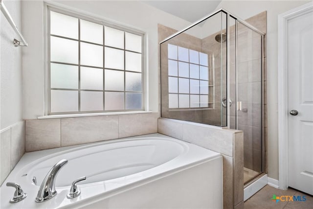 1910 Ashburn Dr, Temple, TX 76502 - bathroom with a garden tub and a shower stall