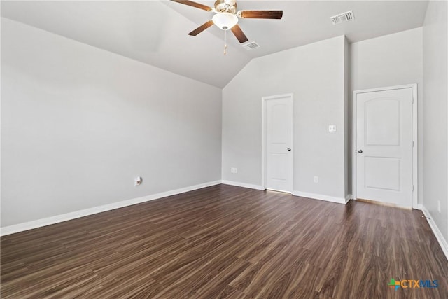 1910 Ashburn Dr, Temple, TX 76502 - spare room featuring a ceiling fan, dark wood-type flooring, lofted ceiling, and baseboards