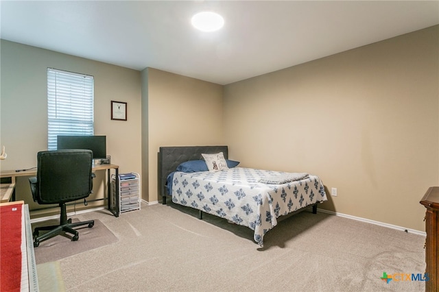 6707 Bayberry Dr, Killeen, TX 76542 - bedroom featuring carpet flooring, baseboards, and a desk