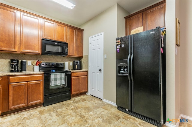 6707 Bayberry Dr, Killeen, TX 76542 - kitchen with black appliances, decorative backsplash, brown cabinetry, and baseboards