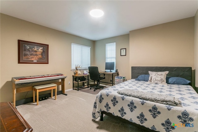 6707 Bayberry Dr, Killeen, TX 76542 - bedroom with light colored carpet and baseboards