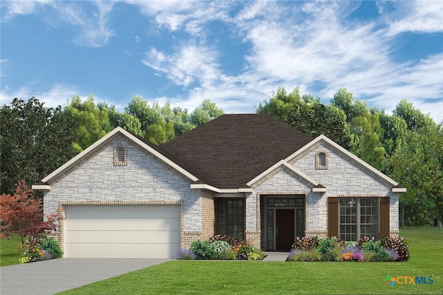 view of front facade with a garage and a front yard