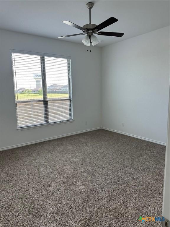 7217 Touchstone Dr, Temple, TX 76502 - carpeted spare room with ceiling fan and baseboards