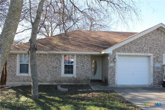 single story home with a garage