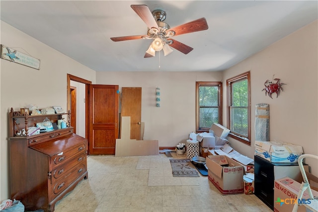 interior space featuring ceiling fan