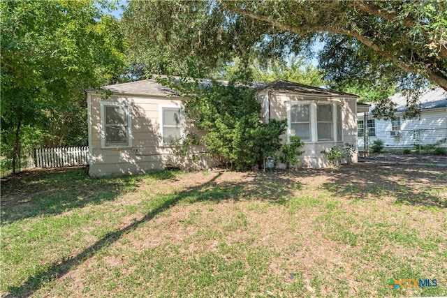 exterior space with a front yard