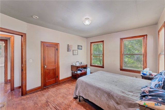 bedroom featuring light hardwood / wood-style floors