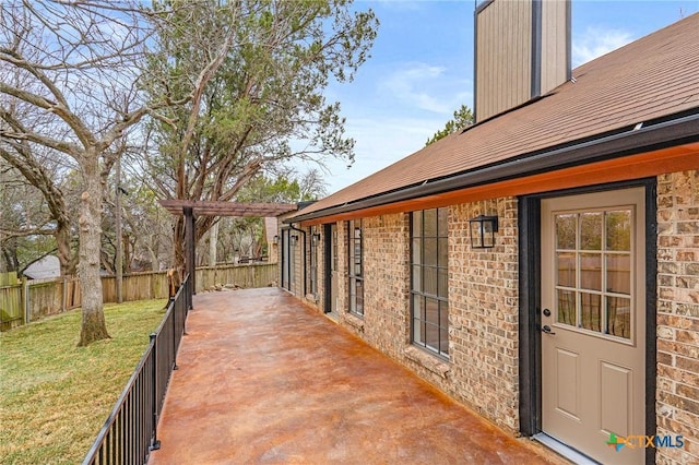 view of patio with fence