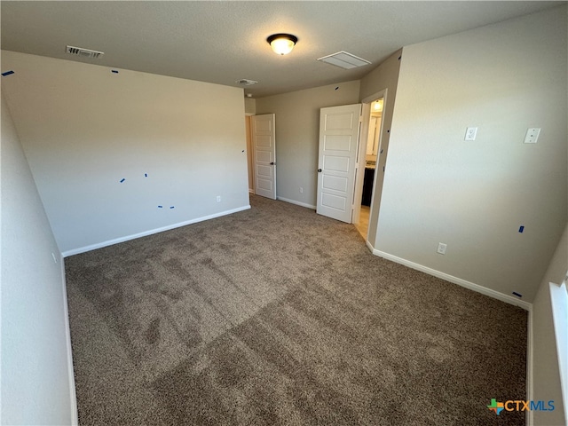 unfurnished bedroom with carpet floors