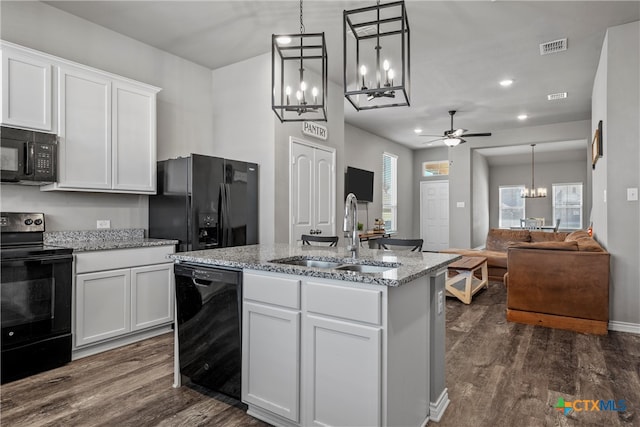 kitchen featuring white cabinets, sink, ceiling fan, and black appliances