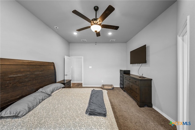 bedroom with ceiling fan and carpet floors