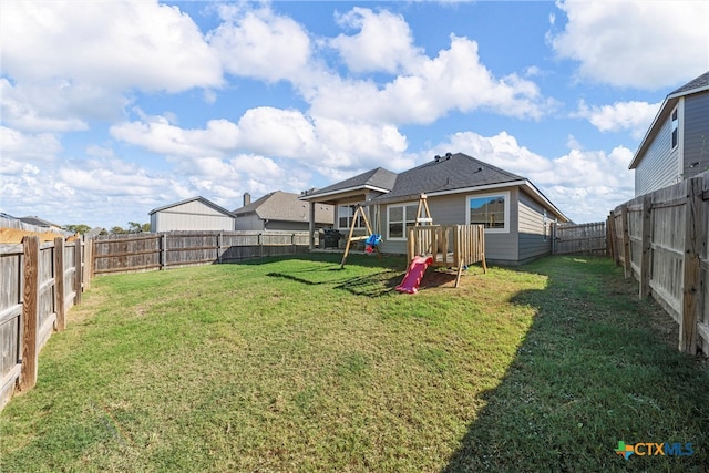 view of yard featuring a playground