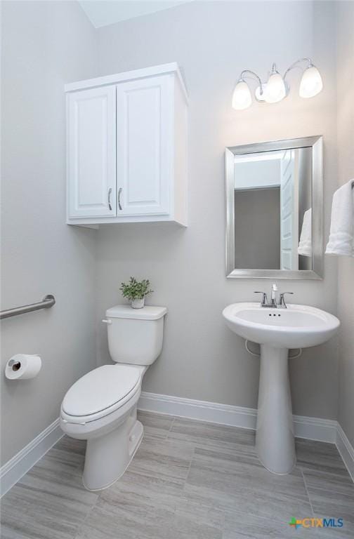 bathroom featuring toilet