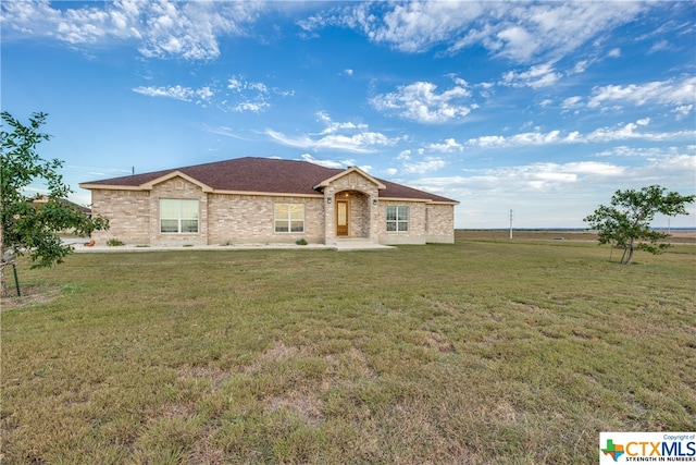 ranch-style home with a front yard