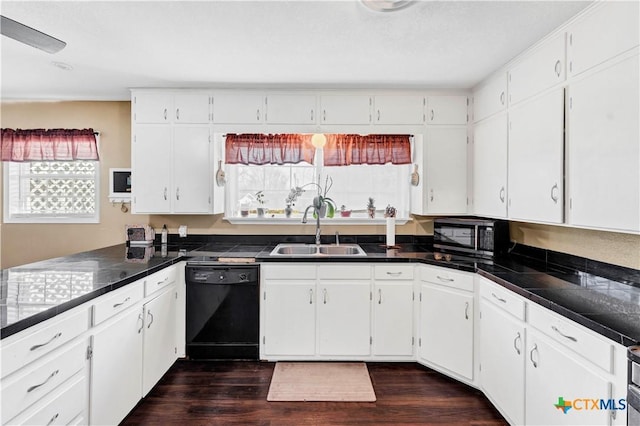 kitchen with white cabinets, sink, dark wood-type flooring, and black appliances