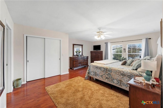 bedroom featuring ceiling fan and hardwood / wood-style floors