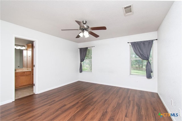 568 Morgans Point Rd, Belton, TX 76513 - spare room featuring plenty of natural light, wood finished floors, and ceiling fan