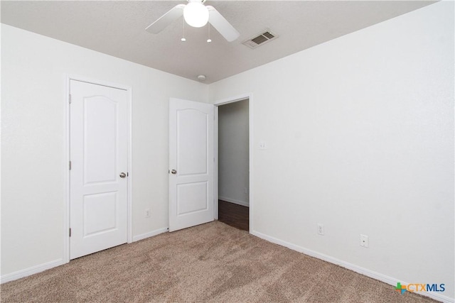 568 Morgans Point Rd, Belton, TX 76513 - unfurnished bedroom with carpet and ceiling fan